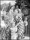 Police taking women with children into custody at Short Creek in 1953.