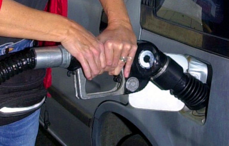 782129 PERSON PUMPING GAS