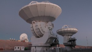 Three antennas await repair at ALMA's low site. Each antenna seen here is designed by a different collaborator -- be it Europe, North America or South Asia -- while Chile's involvement in this worldwide astronomical project cannot be understated; ALMA's array of 66 antennas rest in the country's Atacama Desert. Photo by Joshua Barajas/PBS NewsHour