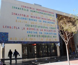 On the entrance to the building, the words "Constitutional Court" is written in all eleven official languages of South Africa. Photographed by Janine Erasmus and Wilma den Hartigh