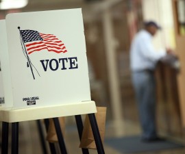 Voting booths are set up for early voting at the Black Hawk County Courthouse on September 27, 2012 in Waterloo, Iowa. Obama says Voter ID laws can be a barrier to the ballot box. Photo by Scott Olson/Getty Images.