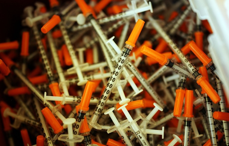 ST. JOHNSBURY, VT - FEBRUARY 06: Used syringes are discarded at a needle exchange clinic where users can pick up new syringes and other clean items for those dependent on heroin on February 6, 2014 in St. Johnsbury, Vermont. Vermont Governor Peter Shumlin recently devoted his entire State of the State speech to the scourge of heroin. Heroin and other opiates have begun to devastate many communities in the Northeast and Midwest leading to a surge in fatal overdoses in a number of states. As prescription painkillers, such as the synthetic opiate OxyContin, become increasingly expensive and regulated, more and more Americans are turning to heroin to fight pain or to get high. Heroin, which has experienced a surge in production in places such as Afghanistan and parts of Central America, has a relatively inexpensive street price and provides a more powerful affect on the user. (Photo by Spencer Platt/Getty Images)