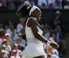 Serena Williams of the U.S.A. reacts during her match against Maria Sharapova of Russia at the Wimbledon Tennis Championships in London, July 9, 2015. REUTERS/Stefan Wermuth - RTX1JR3W
