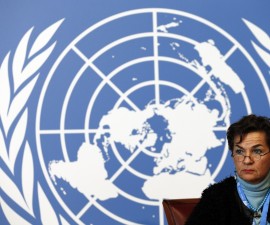 Christiana Figueres, Executive Secretary of the United Nations Framework Convention on Climate Change (UNFCCC), listens during a news conference after a week long preparatory meeting at the U.N. in Geneva February 13, 2015. The United Nations Climate Change Conference, COP21 or CMP11, will be held in Paris November 30 to December 11, 2015. REUTERS/Denis Balibouse (SWITZERLAND - Tags: POLITICS ENVIRONMENT) - RTR4PGGI