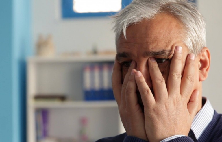 Yassin al-Haj Saleh, center, stands on a street in Istanbul in director Ali Atassi's "Our Terrible Country." The film depicts Saleh's journey from Douma to Raqqa, the stronghold of the Islamic state, before he moves to Istanbul. Photo courtesy of Ali Atassi