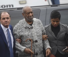 Actor and comedian Bill Cosby (C) arrives with attorney Monique Pressley (R) for his arraignment on sexual assault charges at the Montgomery County Courthouse in Elkins Park, Pennsylvania December 30, 2015. Cosby was charged on Wednesday with sexually assaulting a woman in 2004 after plying her with drugs and alcohol, marking the first criminal case against a once-beloved performer whose father-figure persona was already left tattered by dozens of misconduct allegations. REUTERS/Mark Makela - RTX20K68