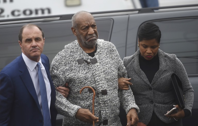 Actor and comedian Bill Cosby (C) arrives with attorney Monique Pressley (R) for his arraignment on sexual assault charges at the Montgomery County Courthouse in Elkins Park, Pennsylvania December 30, 2015. Cosby was charged on Wednesday with sexually assaulting a woman in 2004 after plying her with drugs and alcohol, marking the first criminal case against a once-beloved performer whose father-figure persona was already left tattered by dozens of misconduct allegations. REUTERS/Mark Makela - RTX20K68