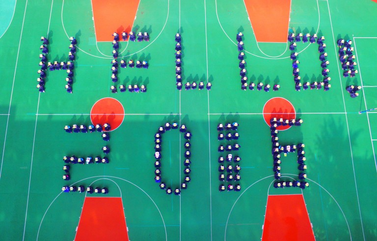 More than 180 high school students form "Hello! 2016" ahead of the new year, at a campus in Shanghai. Photo by Reuters