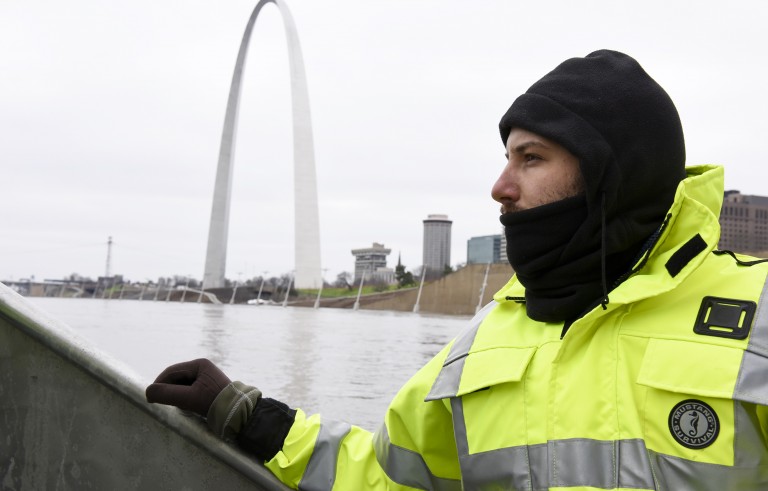 U.S. Geological Survey (USGS) hydro technician Jason Carron assesses the Mississippi River flood waters in St. Louis, Missouri December 31, 2015. Missouri and Illinois were bracing for more flooding on Thursday as rain-swollen rivers, some at record heights, overflowed their banks, washing out hundreds of structures and leaving thousands of people displaced from their homes. REUTERS/Kate Munsch - RTX20O4V