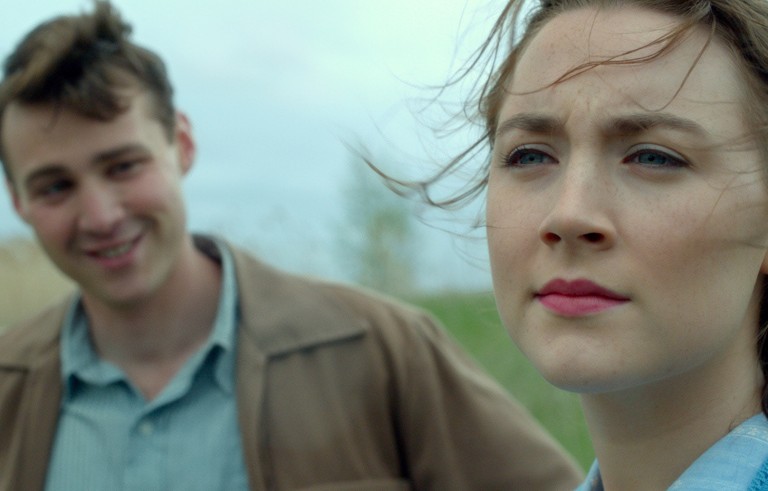 Emory Cohen as "Tony" and Saoirse Ronan as "Eilis" in BROOKLYN. Photo courtesy of Fox Searchlight Pictures. © 2015 Twentieth Century Fox Film Corporation All Rights Reserved