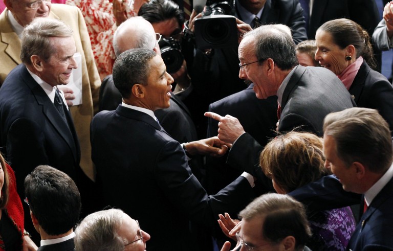 U.S. President Barack Obama talks with Eliot Engel (D-NY) as he walks in before the State of the Union address to a joint session of Congress on Capitol Hill in Washington, January 25, 2011.    REUTERS/Kevin Lamarque (UNITED STATES - Tags: POLITICS) - RTXX2PW