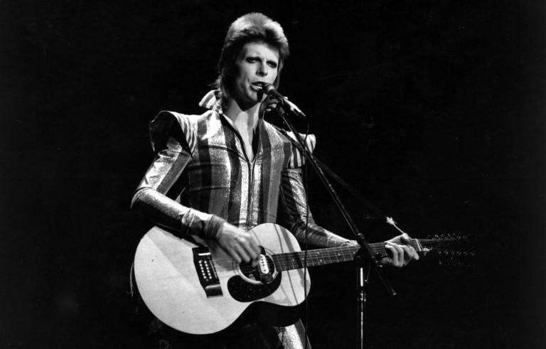Ziggy plays guitar. Photo by Getty Images