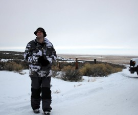 One of the protesters, who gave the name "Captain Moroni," guards the entrance to the refuge Sunday. "Moroni" said he was disappointed that more protesters did not arrive after a widespread call on social media. photo by Amanda Peacher/OPB