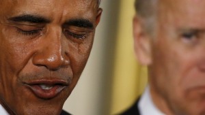 U.S. President Barack Obama is seen in tears while delivering a statement on steps the administration is taking to reduce gun violence in the East Room of the White House in Washington January 5, 2016. Vice President Joe Biden is at right. REUTERS/Carlos Barria - RTX215LR