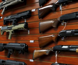 Shotguns are shown for sale at the AO Sword gun store in El Cajon, California, January 5, 2016. President Barack Obama said on Monday his new executive actions to tighten gun rules were "well within" his legal authority and consistent with the U.S. right to bear arms, a warning to opponents who are likely to challenge them in court. REUTERS/Mike Blake - RTX21677