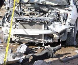 A wrecked vehicle is pictured at the scene of an explosion at the Police Training Centre in the town of Zliten, Libya, January 7, 2016. REUTERS/StringerFOR EDITORIAL USE ONLY. NO RESALES. NO ARCHIVE. - RTX21FG5