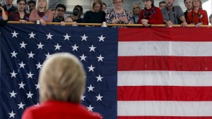 Audience members listen as U.S. Democratic presidential candidate Hillary Clinton speaks during a "Get Out to Caucus" rally at Iowa State University in Ames, Iowa January 30, 2016. REUTERS/Brian Snyder - RTX24Q39