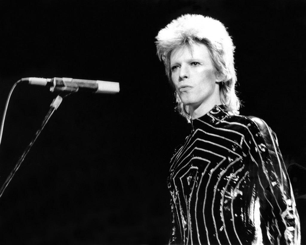 Musician David Bowie performs onstage during his "Ziggy Stardust" era in 1973 in Los Angeles. The legendary music man died after an 18-month battle with cancer. He was 69. Photo by Michael Ochs Archives/Getty Images
