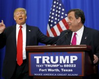 U.S. Republican presidential candidate Donald Trump (L) shakes hands with his former rival for the Republican presidential nomination, New Jersey Governor Chris Christie (R), after Christie endorsed Trump's candidacy for president at a campaign rally in Fort Worth, Texas February 26, 2016. REUTERS/Mike Stone TPX IMAGES OF THE DAY - RTX28RLN