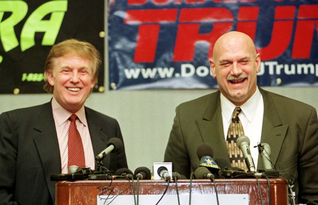 New York real estate developer Donald Trump (L) answers questions as then-Minnesota Gov. Jesse Ventura looks on in Brooklyn Park, January 7, 2000. Trump came to Minnesota to raise money for the Reform Party's highest elected official, Gov. Ventura, who made it clear that he and the New York developer were on the same wavelength. Photo provided by Reuters