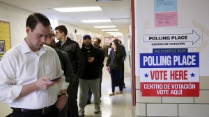 Virginia voters line up early to cast their ballots in Super Tuesday elections at the Wilson School in Arlington, Virginia March 1, 2016.  REUTERS/Gary Cameron - RTS8R64