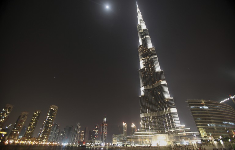 A general view of the Dubai skyline shows the Burj Khalifa building March 25, 2010. Outstanding debt held by Dubai World creditors stood at $14.2 billion at the end of December, excluding Dubai Financial Support Fund (DFSF), the state-owned conglomerate said on Thursday. REUTERS/Mohammed Salem (UNITED ARAB EMIRATES - Tags: CITYSCAPE BUSINESS IMAGES OF THE DAY) - RTR2C2YJ