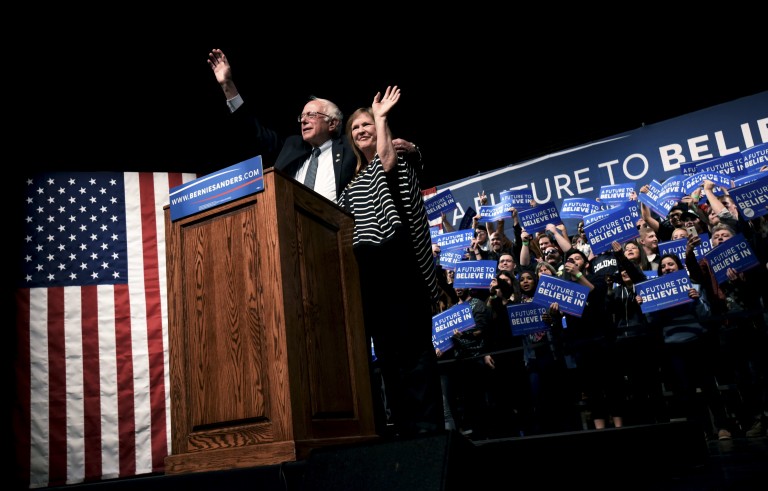 Democratic U.S. presidential candidate Bernie Sanders and his wife Jane wave to the audience at a campaign rally at the University of Wyoming in Laramie, Wyoming April 5, 2016. REUTERS/Mark Kauzlarich - RTSDRQW