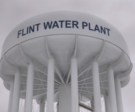The top of a water tower is seen at the Flint Water Plant in Flint, Michigan January 13, 2016. Michigan National Guard members were set to arrive in Flint as soon as Wednesday to join door-to-door efforts to distribute bottled water and other supplies to residents coping with the city's crisis over lead-contaminated drinking water. REUTERS/Rebecca Cook - RTX22AL4