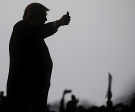 U.S. Republican presidential candidate Donald Trump speaks during a campaign event at an airplane hanger in Rochester, New York April 10, 2016. REUTERS/Carlo Allegri - RTX29CNO