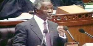 In the U.S., not everyone will get the new HIV drugs, while in Brazil they're provided to all. In South Africa, President Mbeki bans the drugs from government hospitals, claiming they're too toxic.