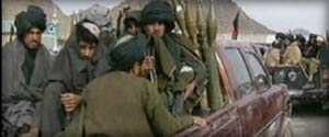 afghani soldiers in a pickup truck