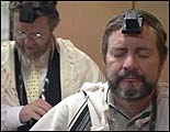 Photo of man praying
