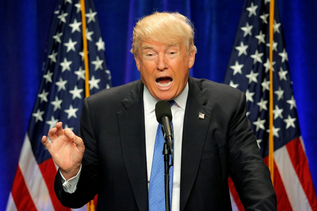 Trump attacks Clinton's record, calls her 'world class liar' | PBS News