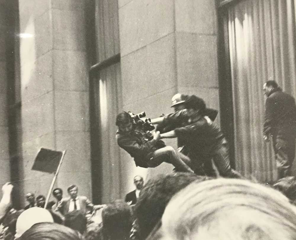 A journalist is attacked on May 8, 1970. Photo by Howard Petrick. Journalist-knocked.jpg