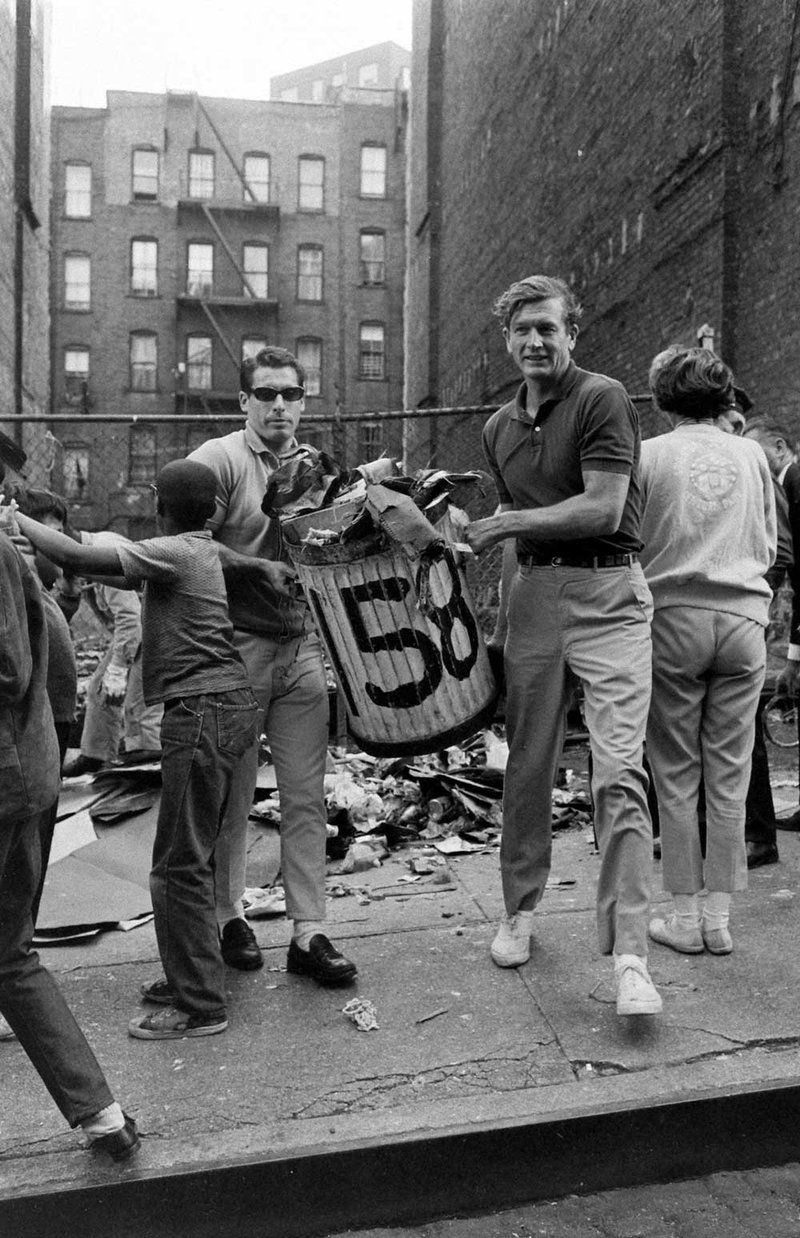 Lindsay and aide Sid Davidoff clear trash during the 1967 sanitation strike. John Dominis/The LIFE Picture Collection/Shutterstock. shutterstock_editorial_11957613d-(1).jpg