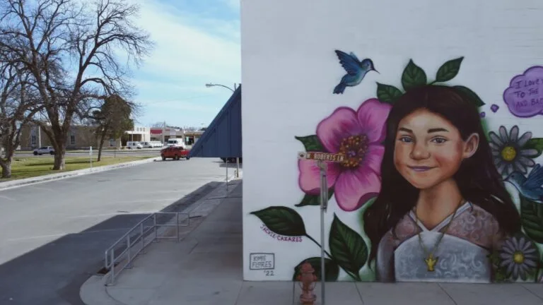 A mural on the side of a building that says, "Jackie Cazares," one of 19 children and two teachers killed in the Robb Elementary School shooting.