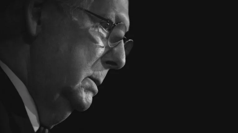 A black and white image of Senator Mitch McConnell.