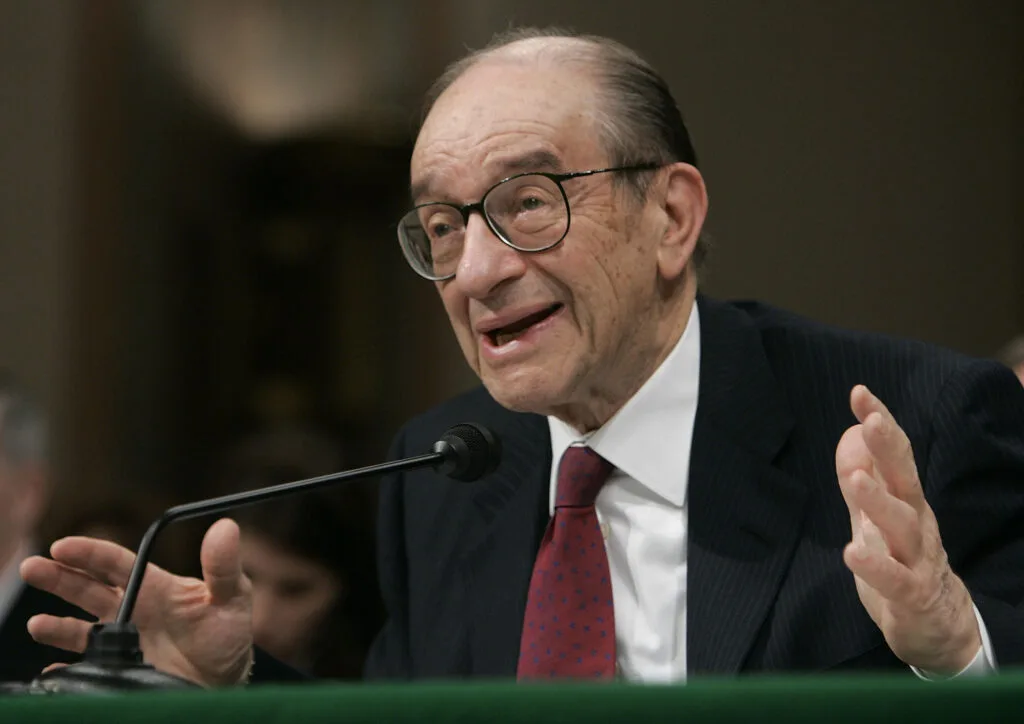 Federal Reserve Chairman Alan Greenspan testified during a Senate Banking, Housing and Urban Affairs Committee hearing on Capitol Hill February 16, 2005 in Washington, DC. Greenspan died in June 2026 at age 100. (Photo by Mark Wilson/Getty Images)