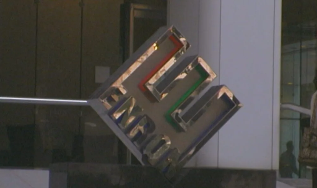 The spectacular collapse of Enron, whose logo is seen in an image from the 2002 FRONTLINE documentary 'Bigger Than Enron,' revealed systemic problems reaching beyond a single company.