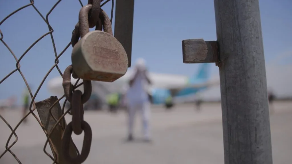 Haitians deported from the U.S. arrive in Haiti, in an image from the documentary 'Haiti Deportation Crisis.'