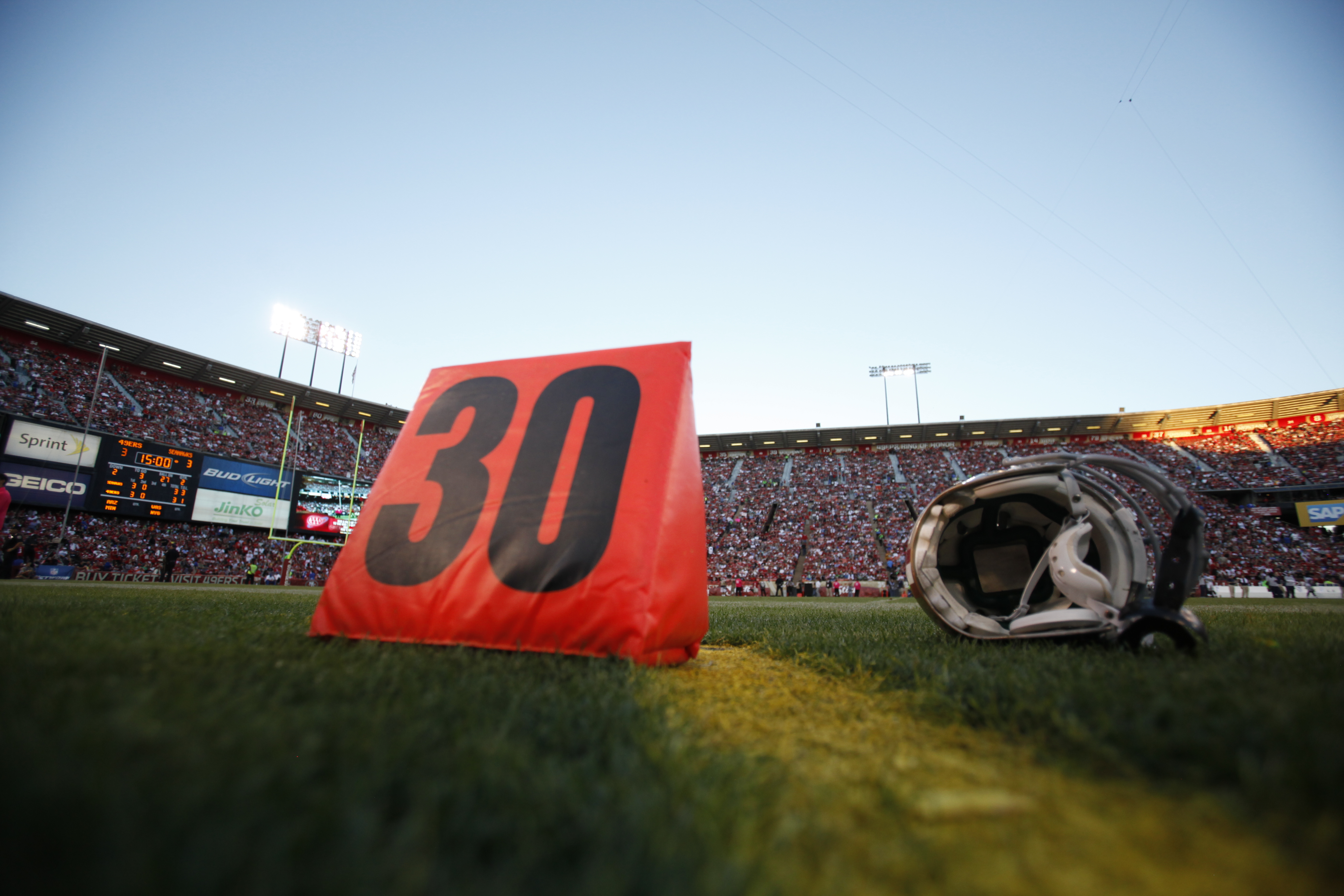 A detail of a helmet and yard marker during the NFL game between the Seattle Seahawks and the San Francisco 49ers on Thursday, October 18, 2012 in San Francisco, California.