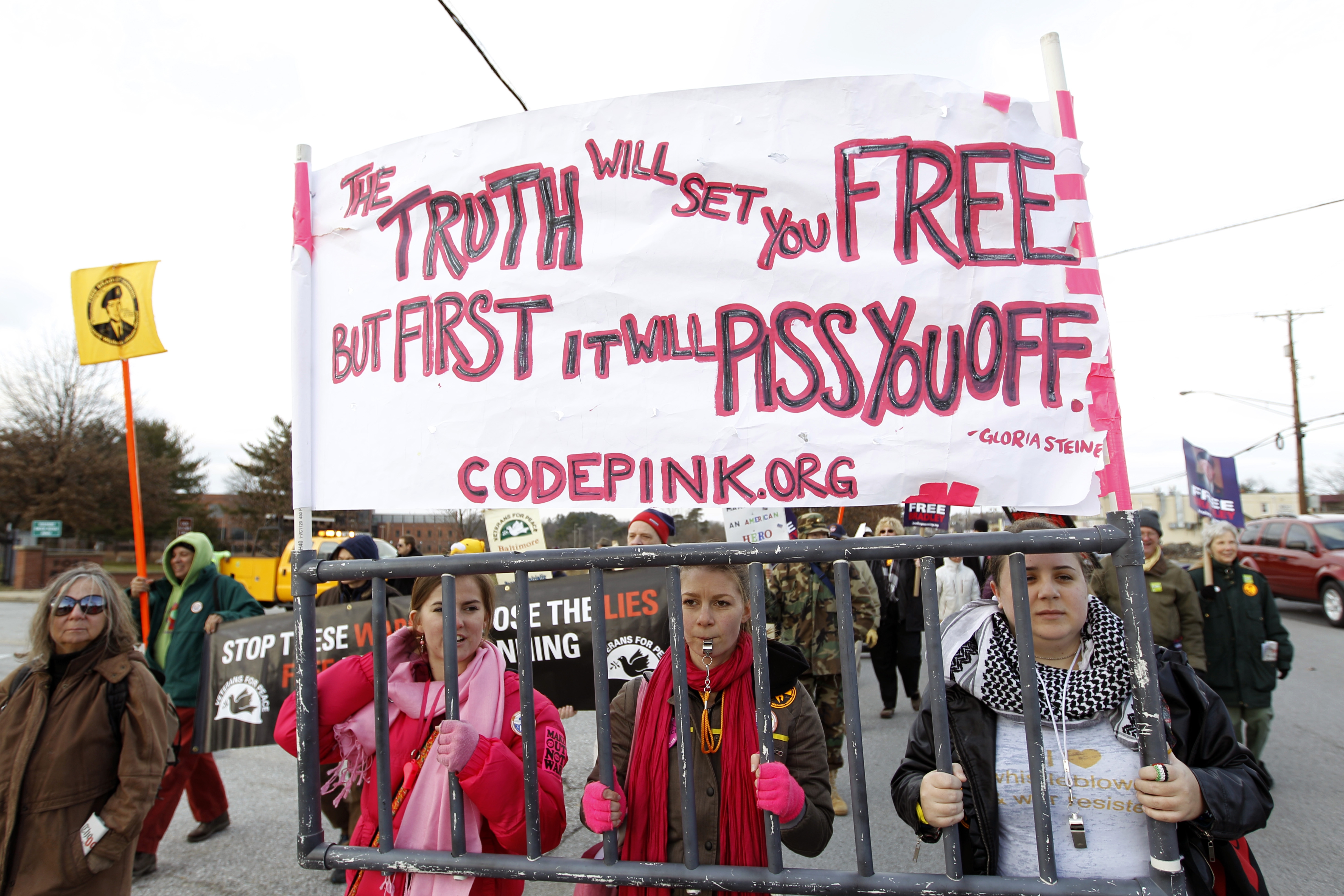 Hundreds of demonstrators march in support of Army Pfc. Bradley Manning, present on base at a military court hearing, at Ft. Meade, Md., Saturday, Dec. 17, 2011. Prosecutors began presenting their case that Manning was the source of the WikiLeaks website's collection of U.S. military and diplomatic secrets.