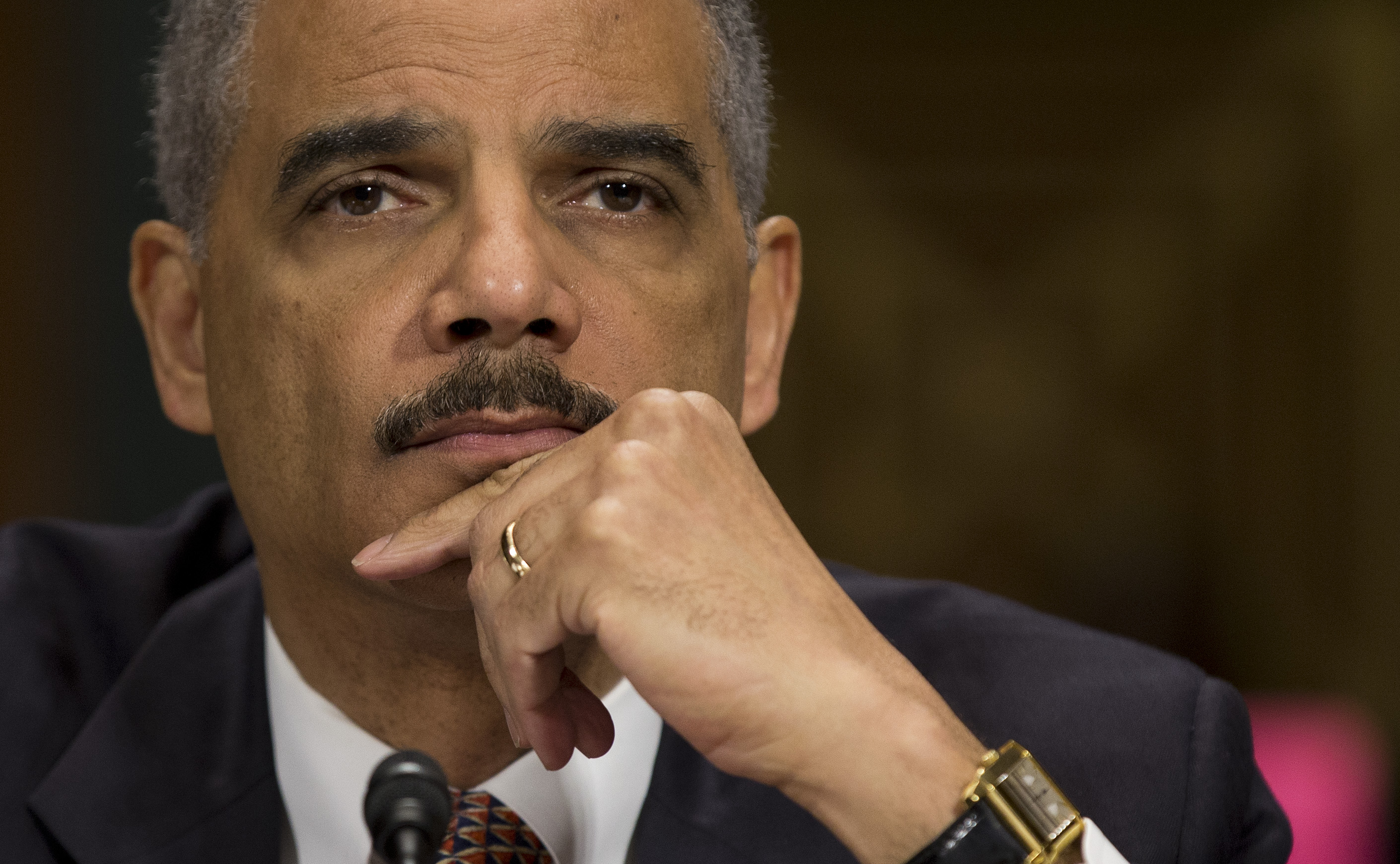 Attorney General Eric Holder pauses as he testifies on Capitol Hill in Washington, Wednesday, March 6, 2013, before the Senate Judiciary Committee hearing: "Oversight of the U.S. Department of Justice." (AP Photo/Evan Vucci)