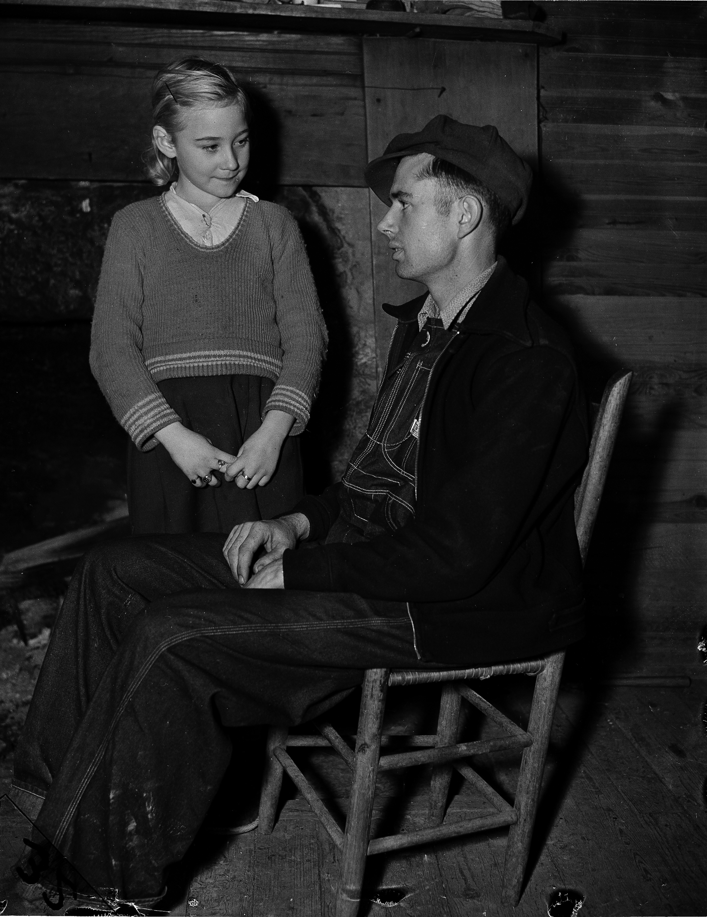 Nine-year-old Eunice Winstead Johns and her six-foot mountaineer husband, Charlie Johns, 22, are shown at their home in Sneedville, Tenn., Feb. 2, 1937. Gov. Gordon Browning of Tennessee called the marriage, which provoked widespread discussion, "Nothing Short of Tragedy." (AP Photo)