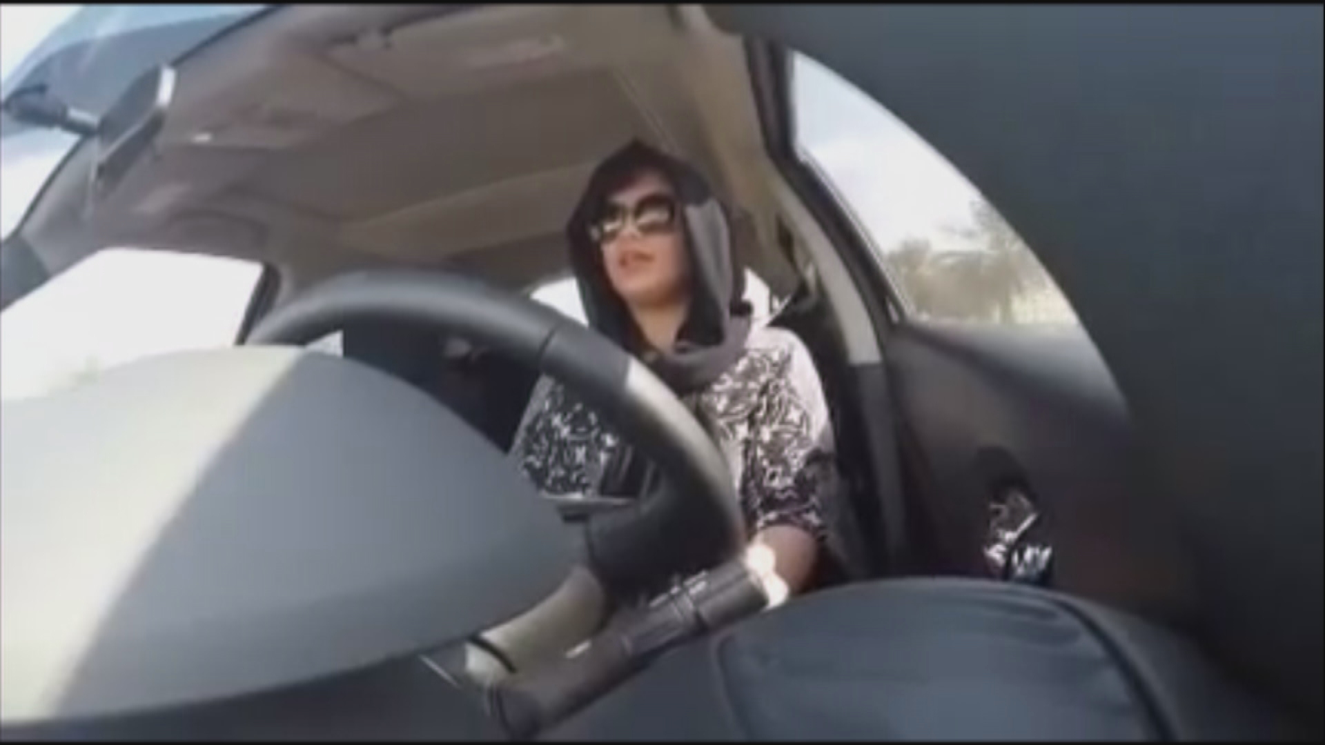 Above, Saudi women's rights activist Loujain Hathloul as she tried to drive into Saudi Arabia in 2014. She was arrested shortly after and imprisoned for 73 days.