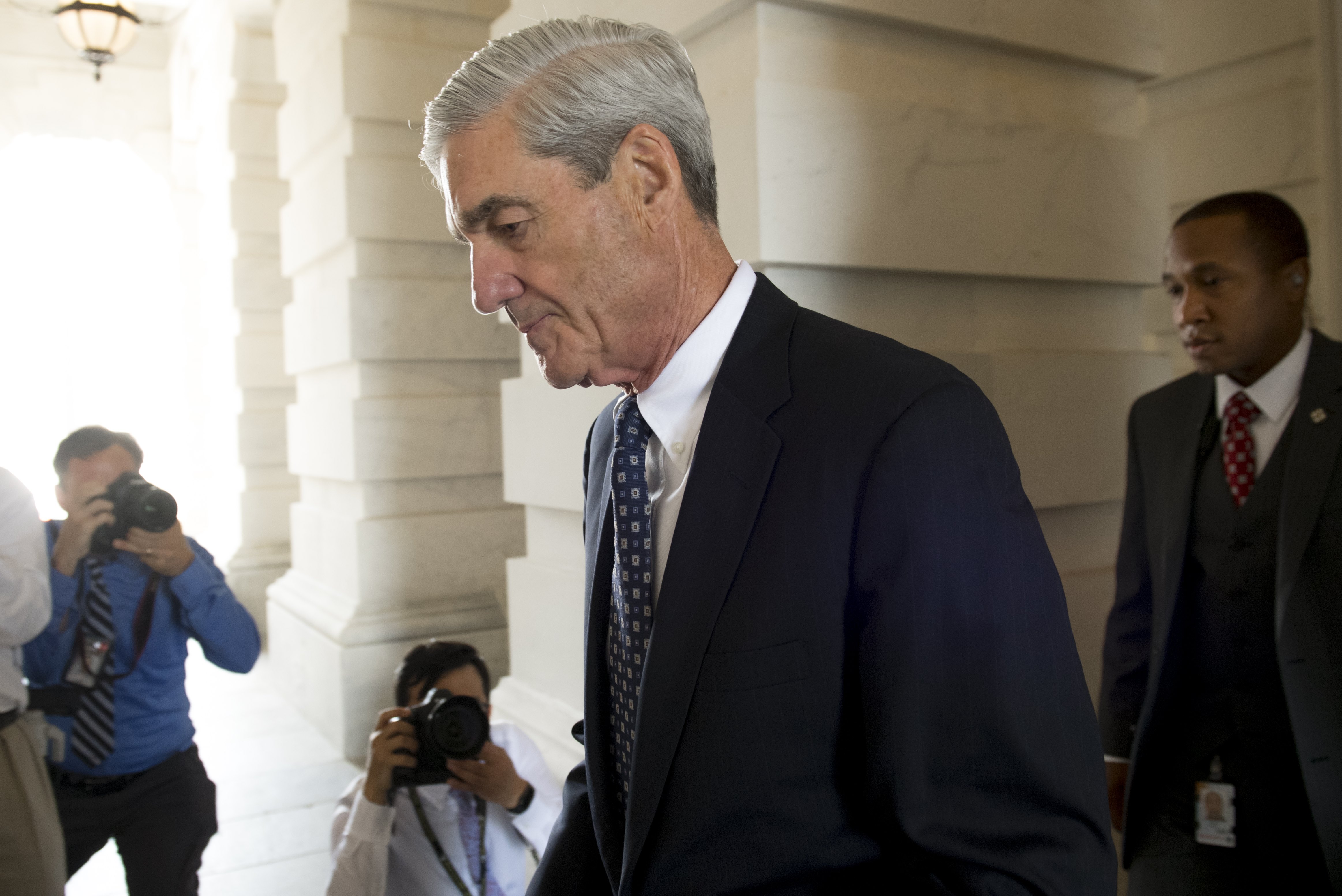 Former FBI Director Robert Mueller, special counsel on the Russian investigation, leaves following a meeting with members of the US Senate Judiciary Committee at the US Capitol in Washington, DC on June 21, 2017. / AFP PHOTO / SAUL LOEB        (Photo credit should read SAUL LOEB/AFP/Getty Images)