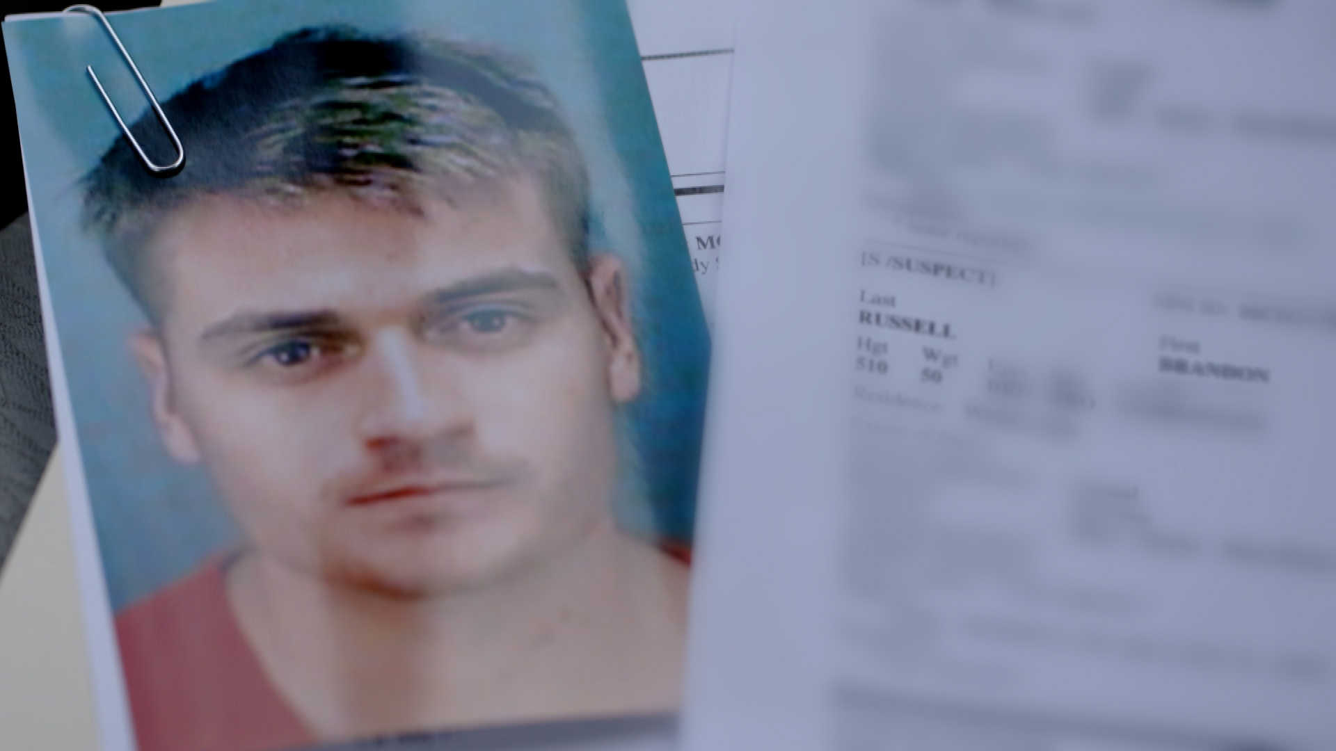 A mugshot of Brandon Russell.