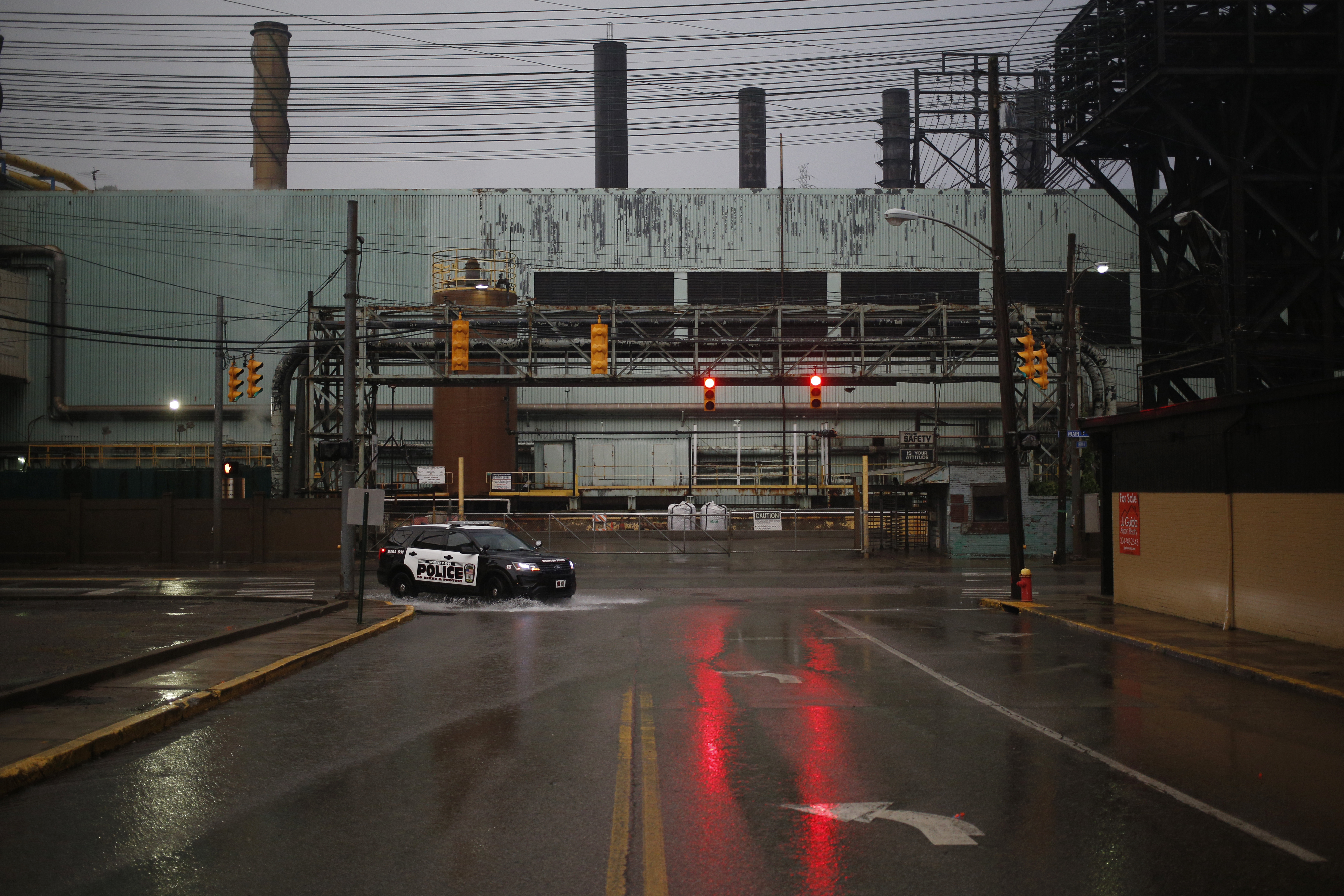 A Weirton Police Department cruiser drives down Main Street on June 20, 2018 in Weirton, W.Va.