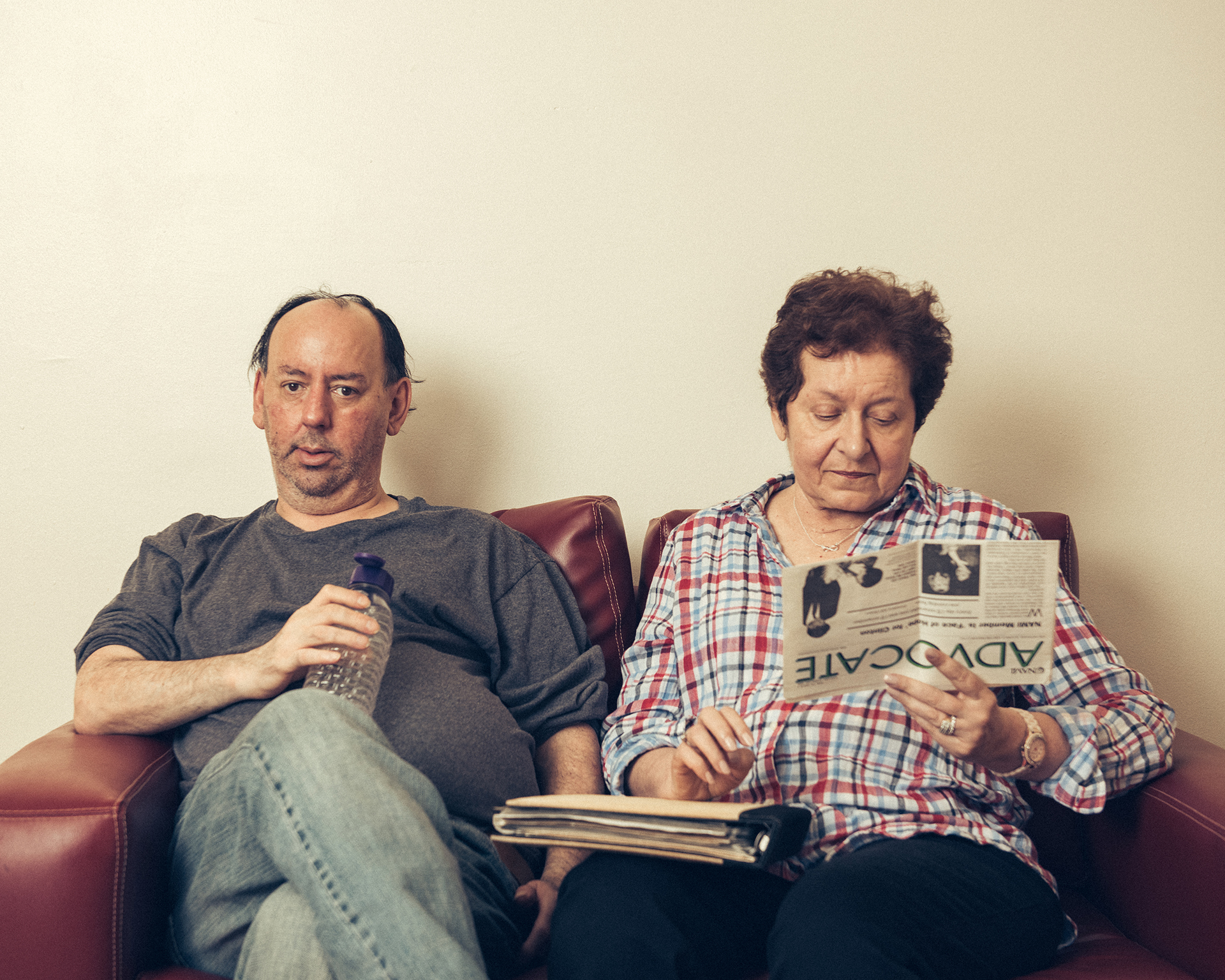 A portrait of Nestor Bunch and his mother's old friend, Nora Weinerth, on his couch in Brooklyn on September 16, 2018.