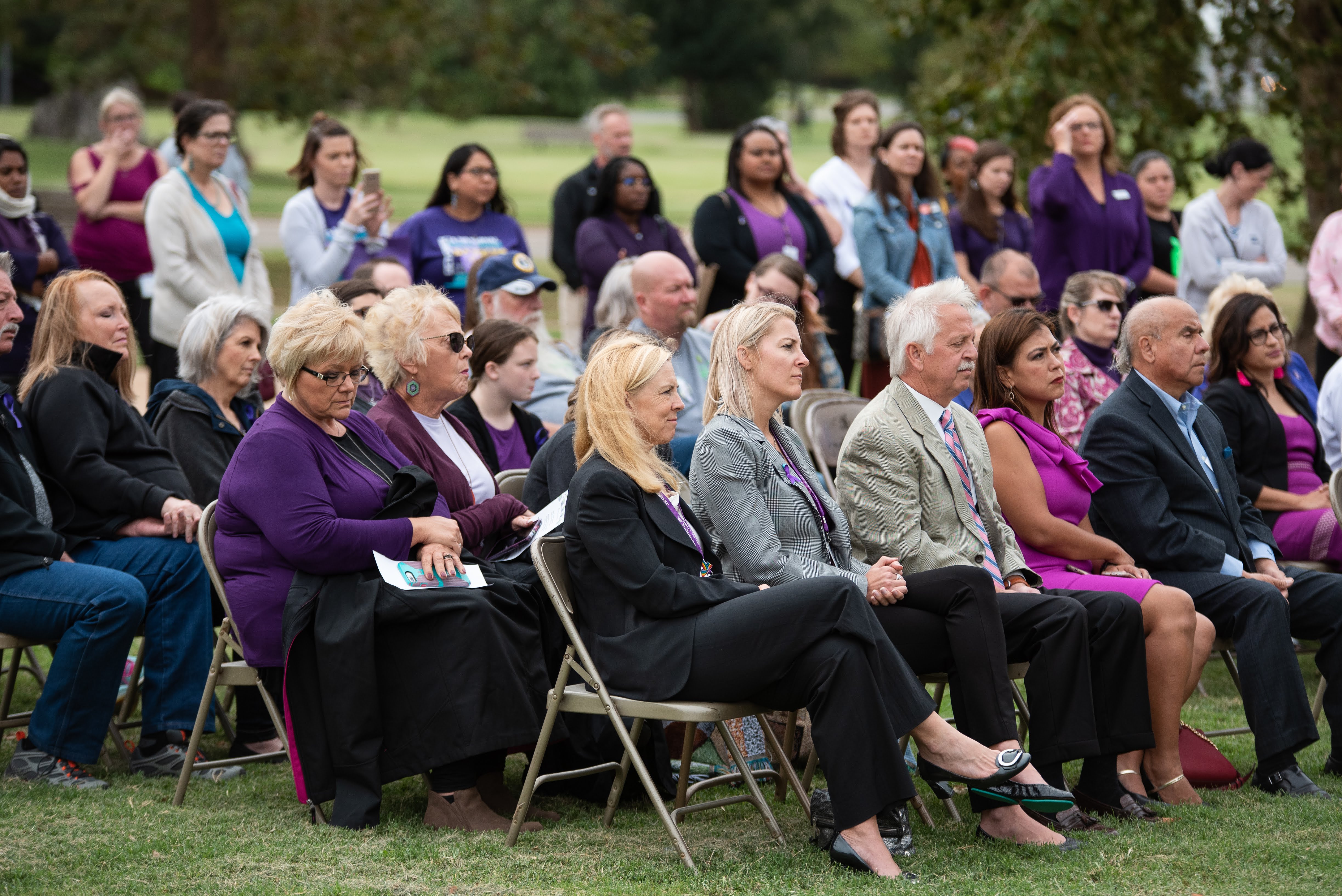 Dozens gathered for the YWCA's annual wreath ceremony, which launches the nonprofit's Domestic Violence Awareness Month events.